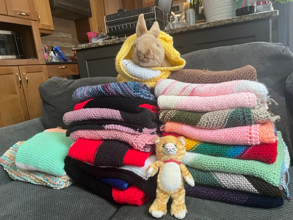 A stack of blankets that will be donated the Winnipeg Humane Society